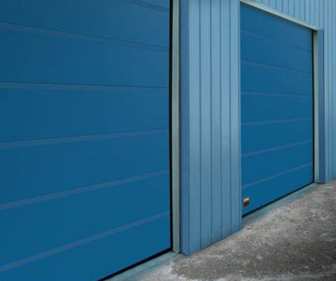 650N/M2 हवा का दबाव औद्योगिक अनुभागीय दरवाजे अनुभागीय ओवरहेड गैरेज दरवाजा यूरोपीय मानक गुणवत्ता आधुनिक दरवाजा